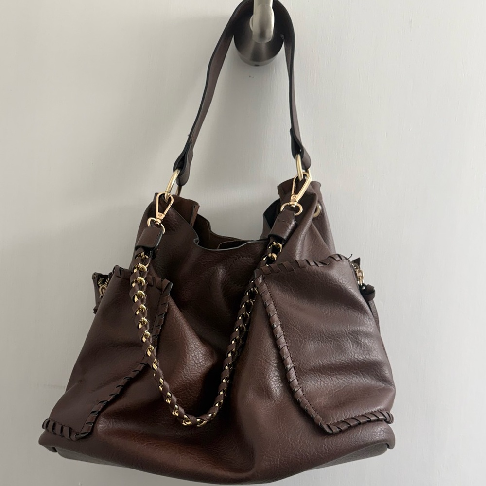 dark brown faux leather hobo shoulder bag with a gold-tone chain detail